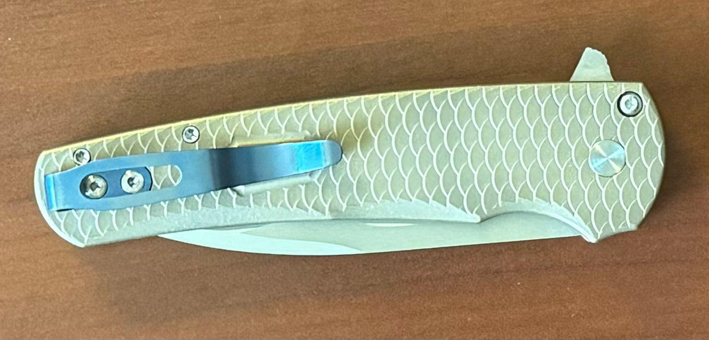 Pro-Tech-Pro-Tech Custom Malibu Blade Show Atlanta 2024 Exclusive Malibu - Distressed A1Bronze "Dragon Scale" Handle - Mike Irie Compound Hand Ground Mirror Polish Wharncliffe Blade - Mosaic Pin Push Button - Blue Titanium Clip /40-Urban Cutlery