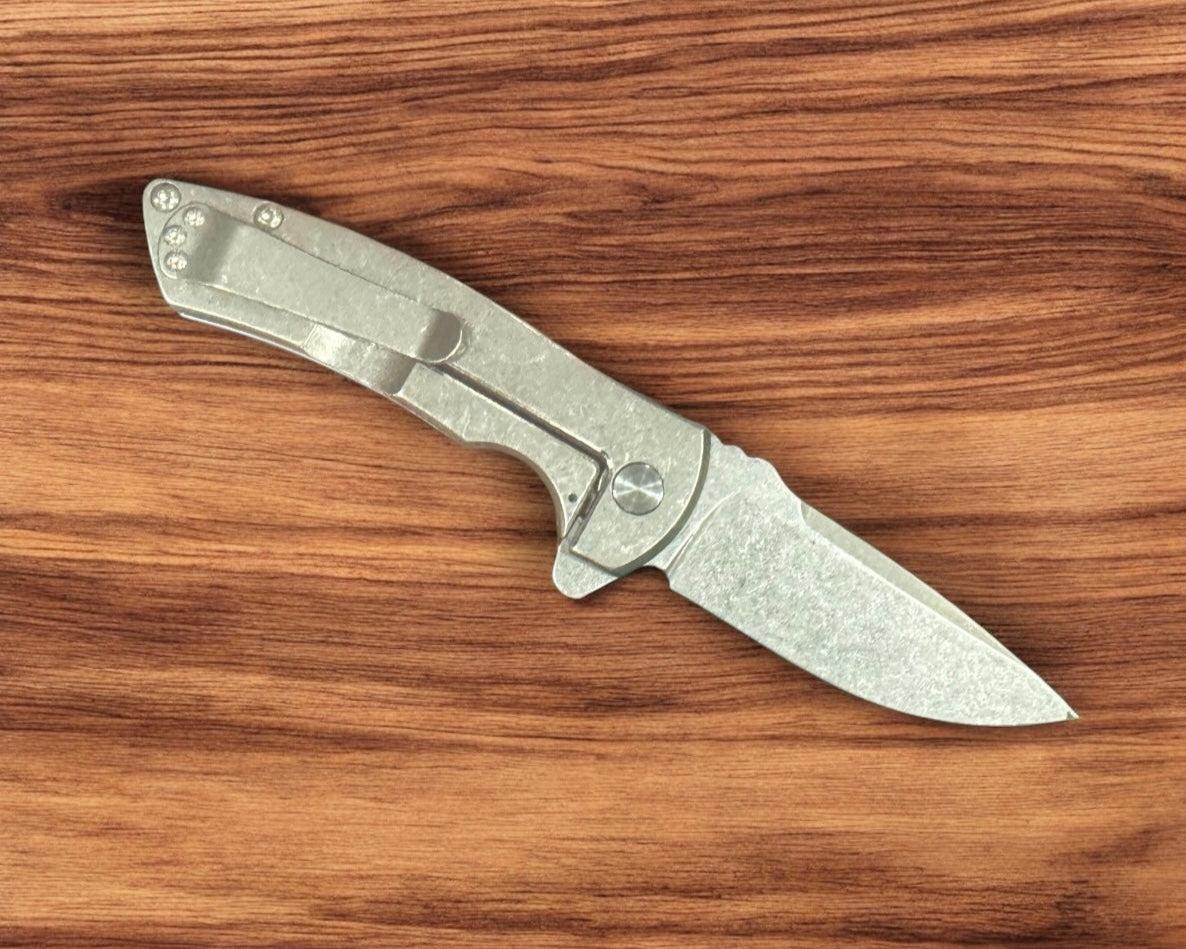 Defiant7-Les George Defiant 7 Hydrax Flipper - Titanium Handles w/ Carbon Fiber Inlay - MagnaCut Stonewashed Blade-Urban Cutlery