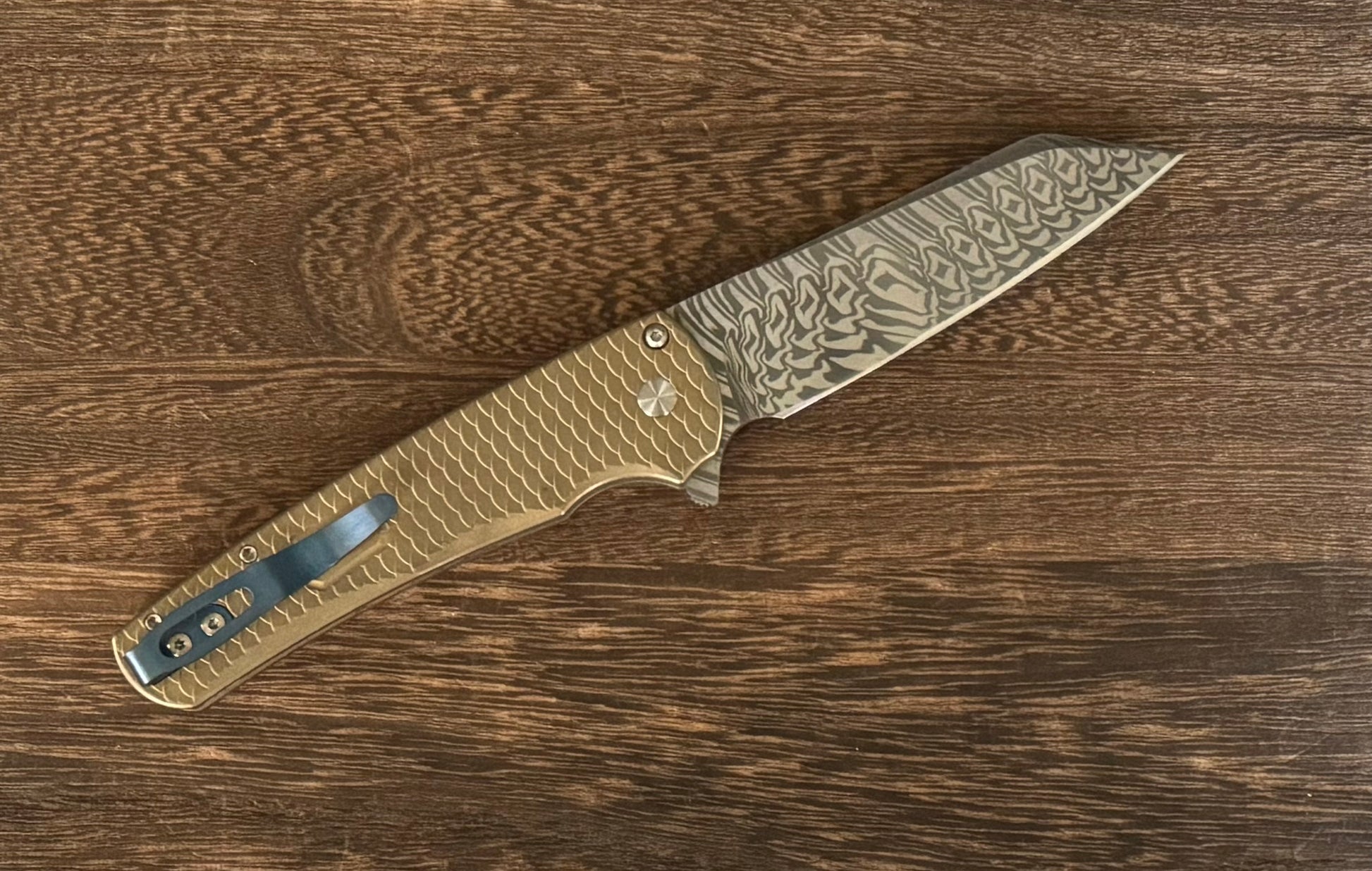 Pro-Tech Custom Malibu Blade Show Atlanta 2024 Exclusive Malibu - Distressed A1Bronze "Dragon Scale" Handle - Mike Irie Compound Hand Ground DAMASTEEL Reverse Tanto Blade - Mosaic Pin Push Button - Blue Titanium Clip /60 Pro-Tech Urban Cutlery & Lifestyle Shoppe