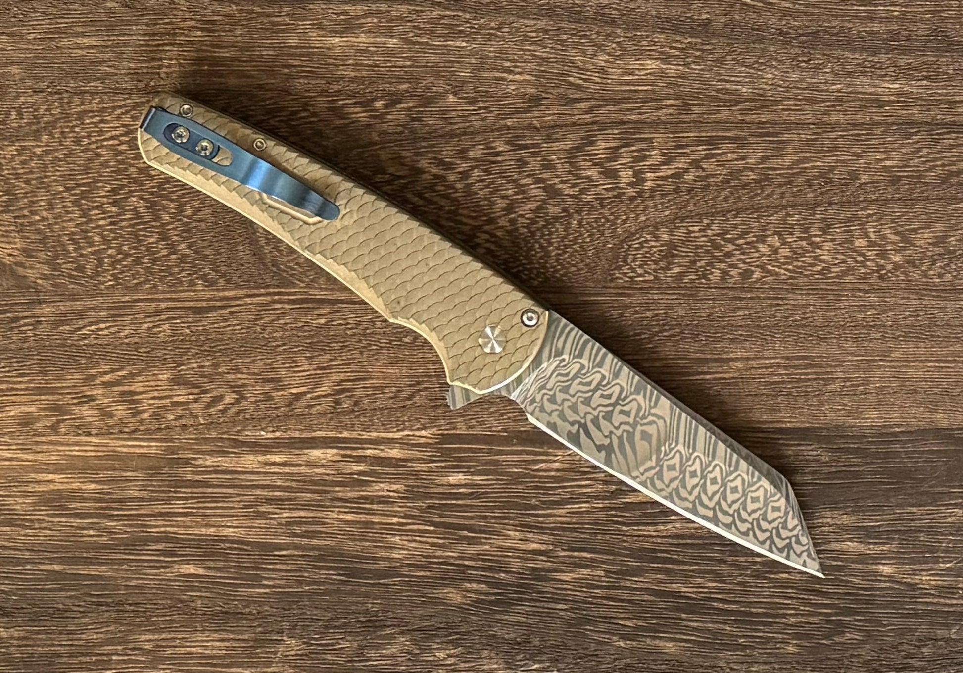 Pro-Tech Custom Malibu Blade Show Atlanta 2024 Exclusive Malibu - Distressed A1Bronze "Dragon Scale" Handle - Mike Irie Compound Hand Ground DAMASTEEL Reverse Tanto Blade - Mosaic Pin Push Button - Blue Titanium Clip /60 Pro-Tech Urban Cutlery & Lifestyle Shoppe