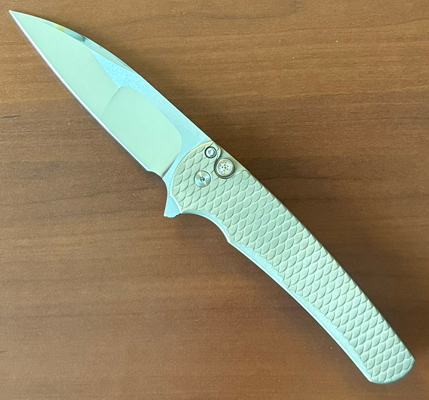 Pro-Tech Custom Malibu Blade Show Atlanta 2024 Exclusive Malibu - Distressed A1Bronze "Dragon Scale" Handle - Mike Irie Compound Hand Ground Mirror Polish Wharncliffe Blade - Mosaic Pin Push Button - Blue Titanium Clip /40 Pro-Tech Urban Cutlery & Lifestyle Shoppe