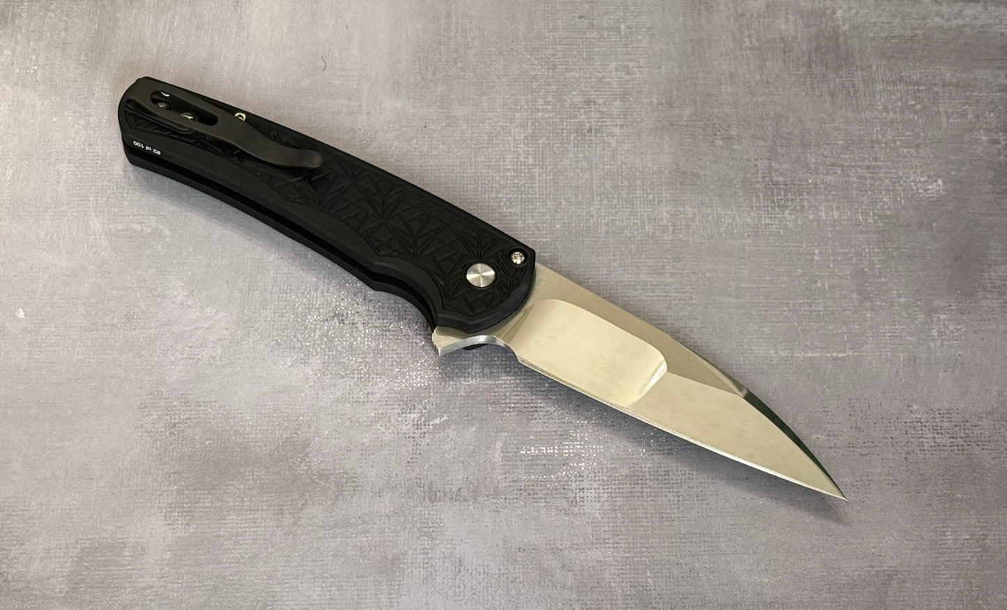 Pro-Tech Custom Malibu Nexus (2024 Malibu Custom 001) - 25 Year Anniversary Pattern Milled Handle - Mike Irie Compound Hand Ground Mirror Polish Wharncliffe Blade - Black Pearl Inlaid Push Button - Black DLC Titanium Clip /100 Pro-Tech Urban Cutlery & Lifestyle Shoppe