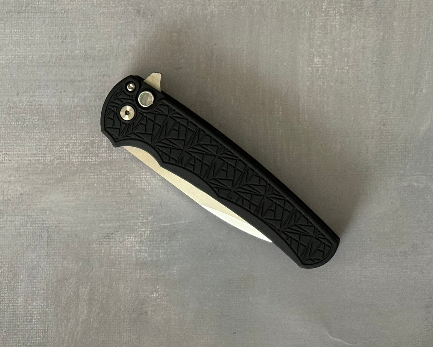 Pro-Tech Custom Malibu Nexus (2024 Malibu Custom 001) - 25 Year Anniversary Pattern Milled Handle - Mike Irie Compound Hand Ground Mirror Polish Wharncliffe Blade - Black Pearl Inlaid Push Button - Black DLC Titanium Clip /100 "Prototype" Pro-Tech Urban Cutlery & Lifestyle Shoppe