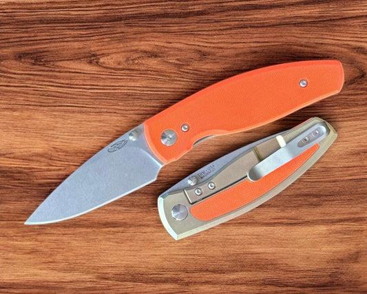 Three Rivers Mfg.-Three Rivers Mfg. (TRM) Neutron 2 FRAME LOCK - ORANGE G10 and Bronze Anodized w/ Orange Inlay Handles - Magnacut Blade-1-Urban Cutlery